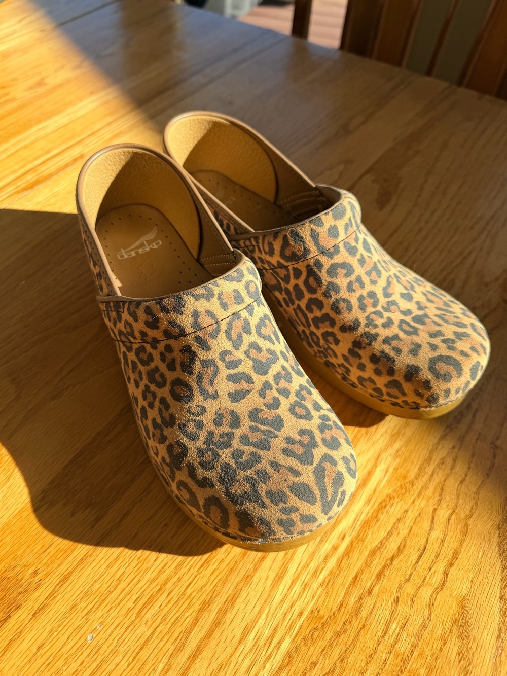 Dansko Leopard Print Clogs in Tan and Black
